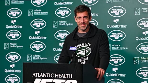 Jets' QB Aaron Rodgers at the podium during OTAs